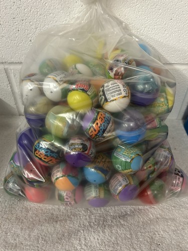 100 toy filled capsules - 100,