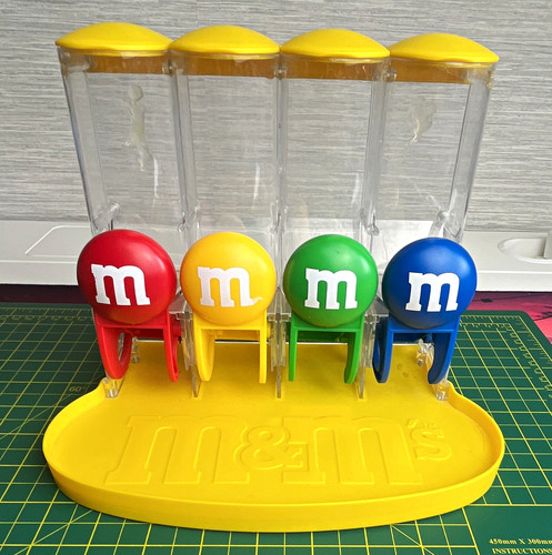 Chute candy dispenser - m&m's,